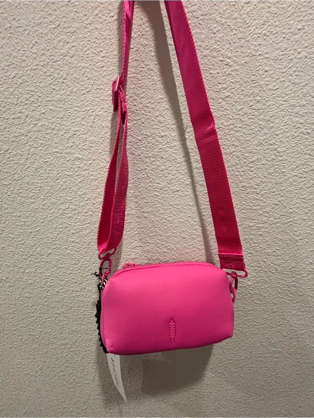 Compact Pink Crossbody Bag with Adjustable Strap